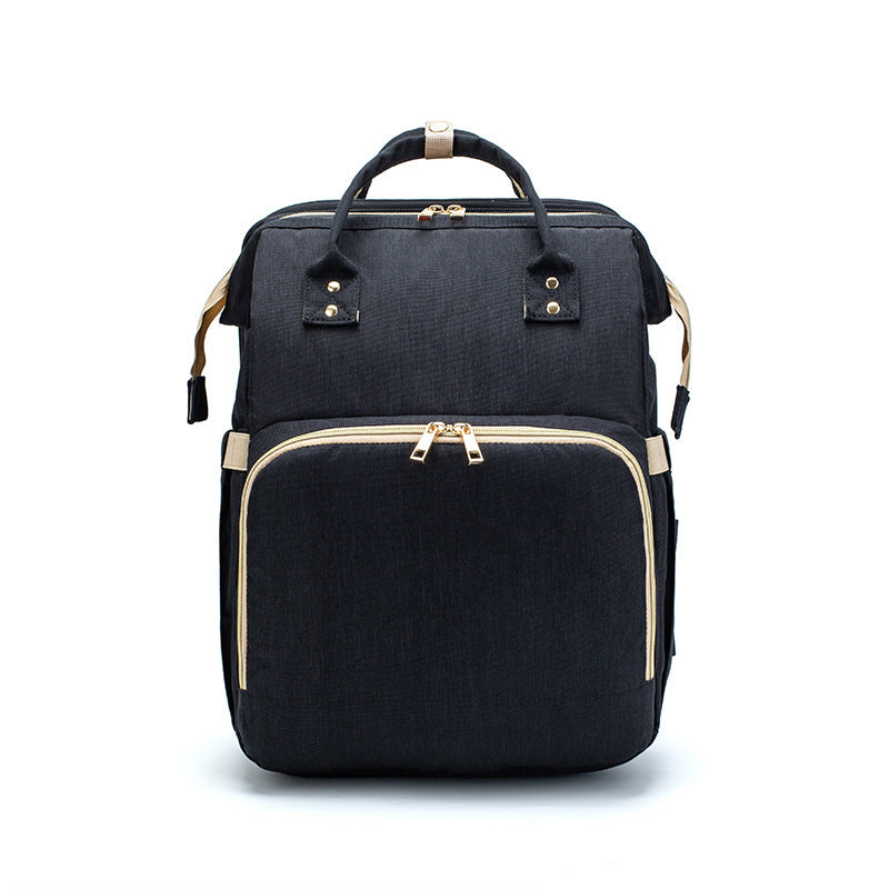 Portable Baby Haven: Diaper Bag Backpack with Built-In Bed & Charging Port!